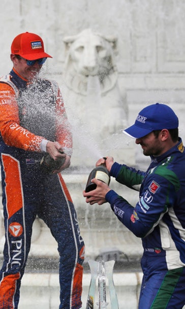 The Latest: Rossi wins IndyCar pole at Belle Isle